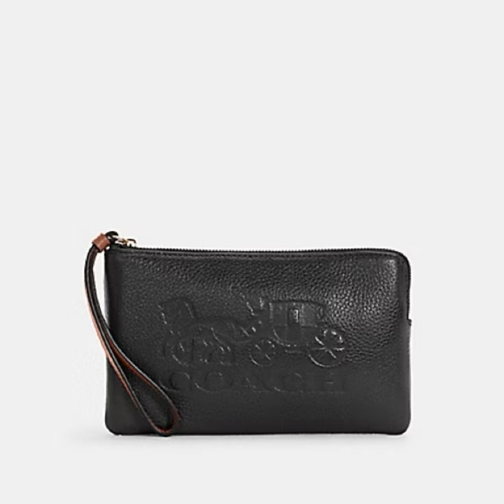 Coach Black Toiletry Bag with Embossed Design